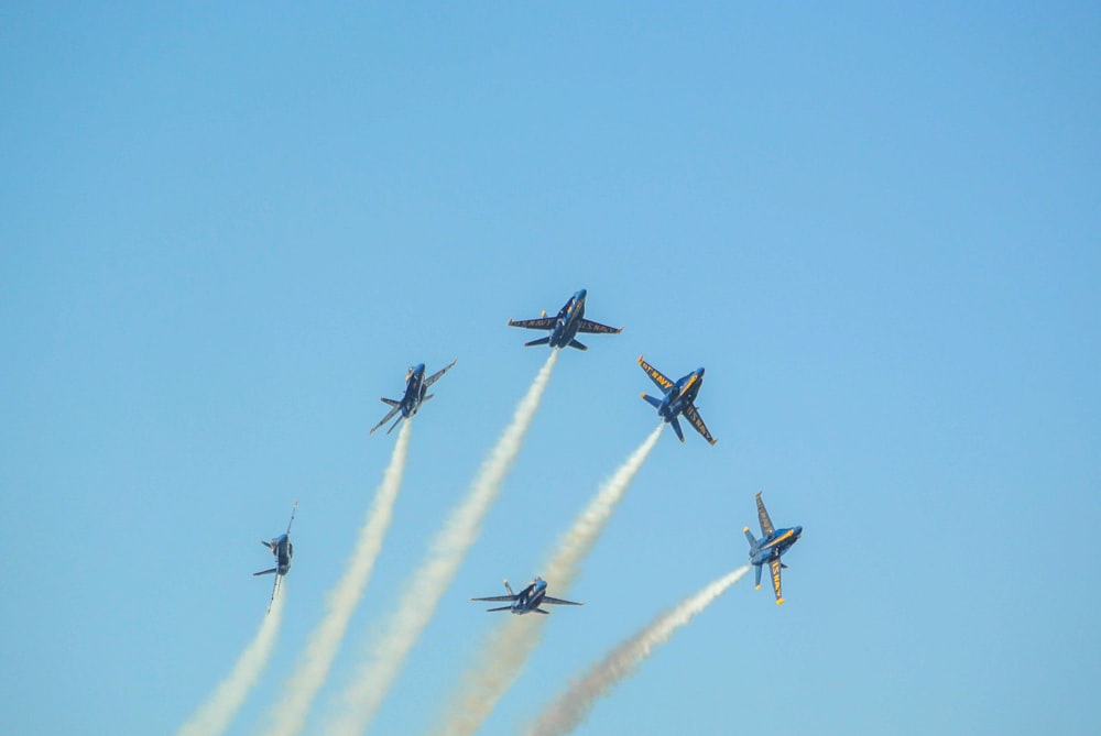 four fighter planes in mid air