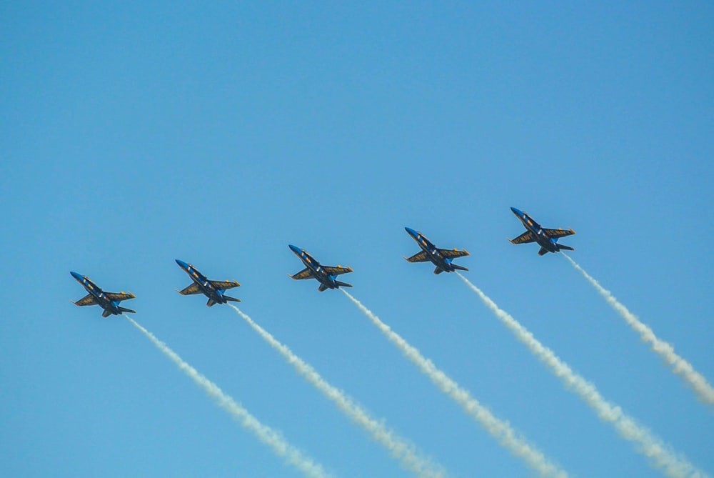 four fighter planes in mid air