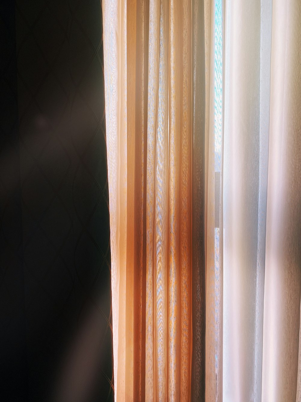 white and brown window curtain