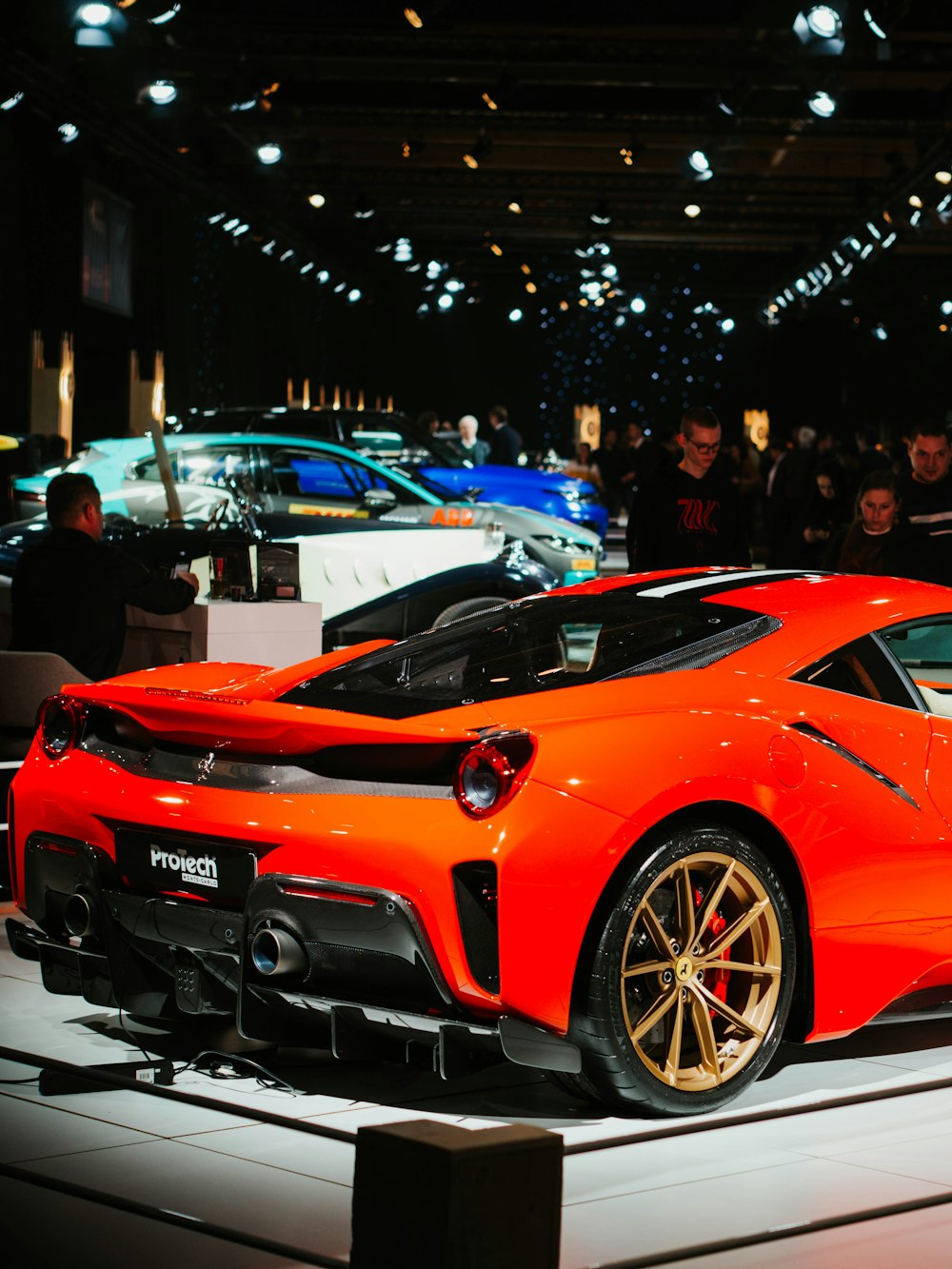 red ferrari 458 italia parked on street