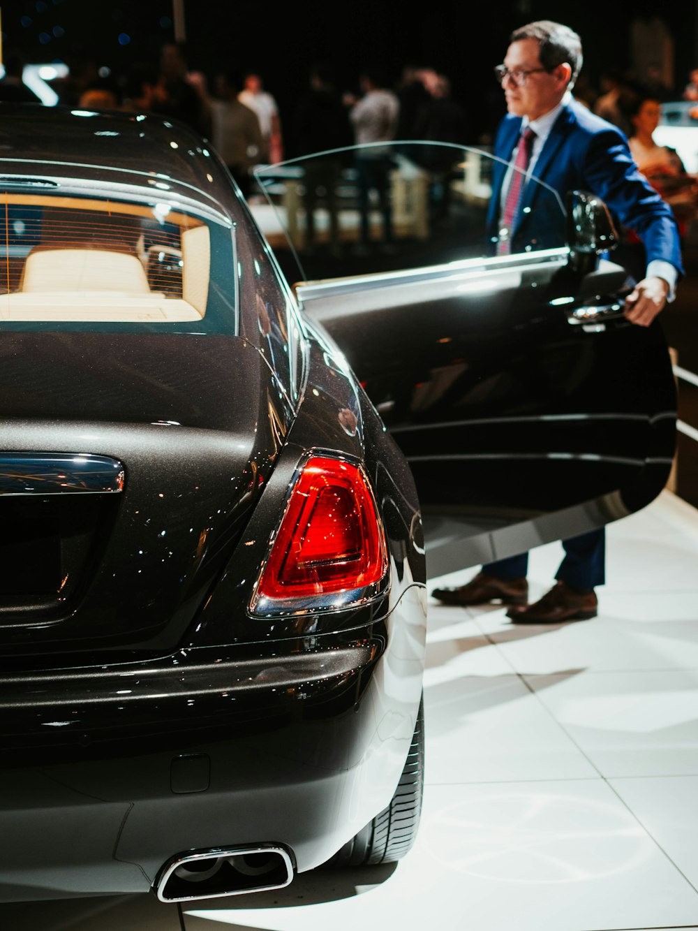 black car on white ceramic tiles