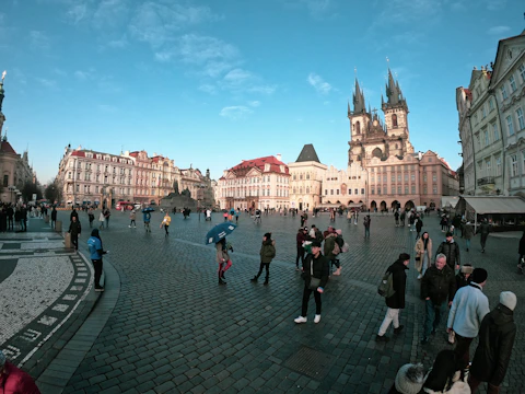 A vibrant screenshot of a bustling town square in Dark Saga with players interacting.