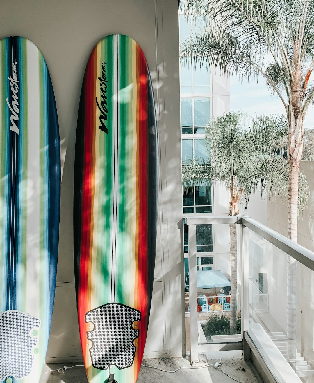 red white and blue striped surfboard