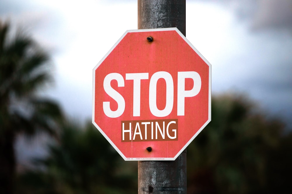 red stop road sign during daytime