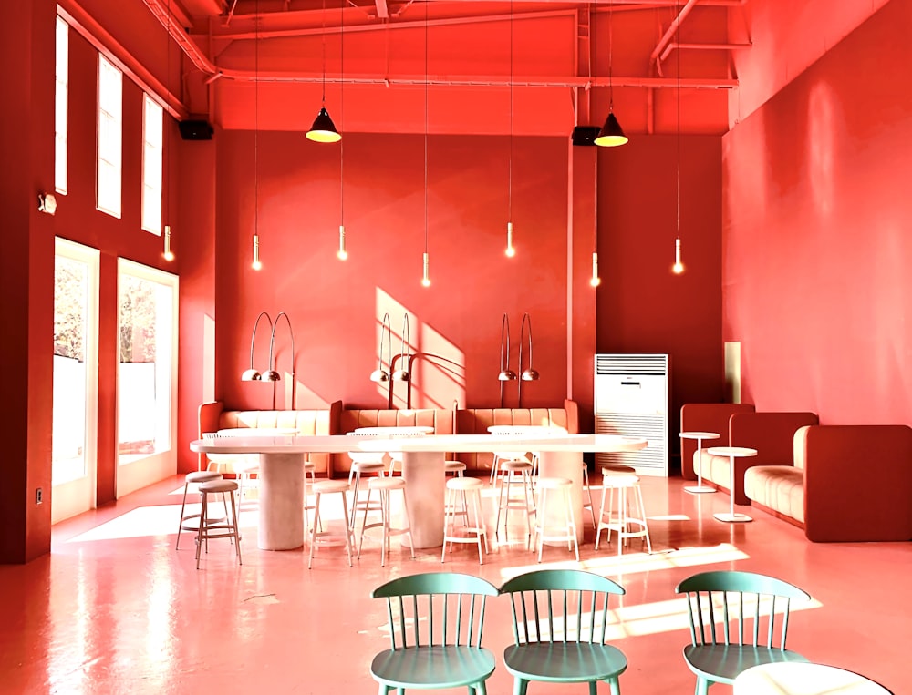 white and red chairs and tables