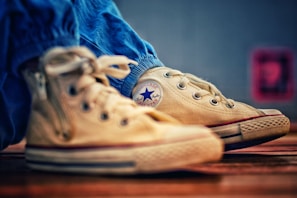 A close-up of stylish shoes paired with casual attire.