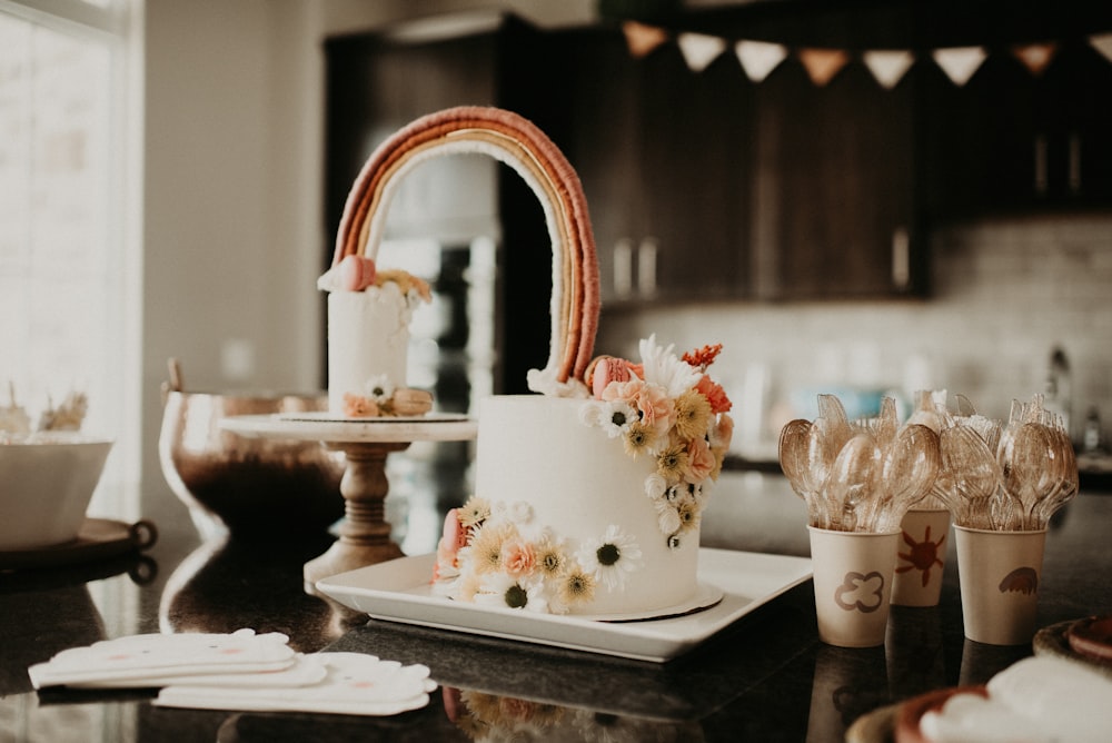 white 3 tier cake on table