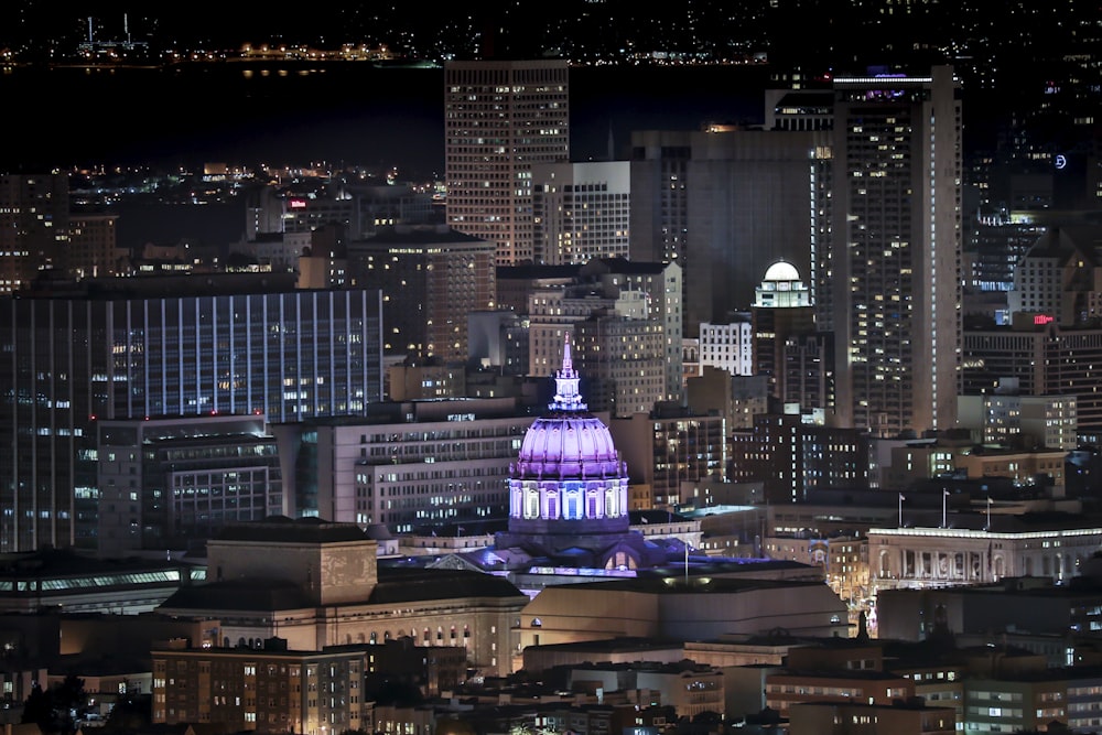 city skyline during night time