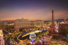 city with lights turned on during night time