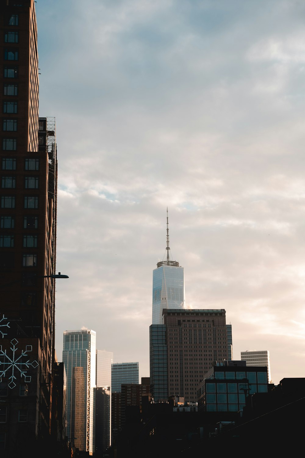 high rise buildings under white sky during daytime