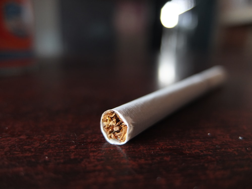 gold ring on brown wooden table