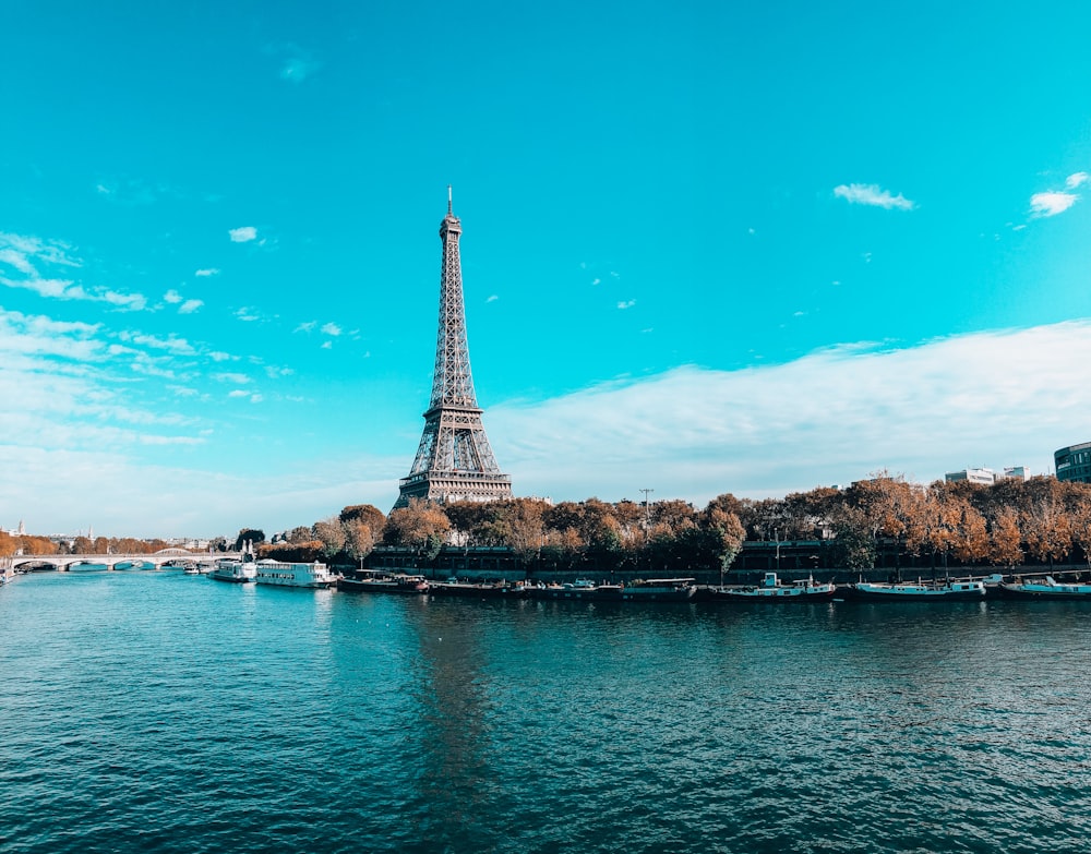 eiffel tower near body of water during daytime