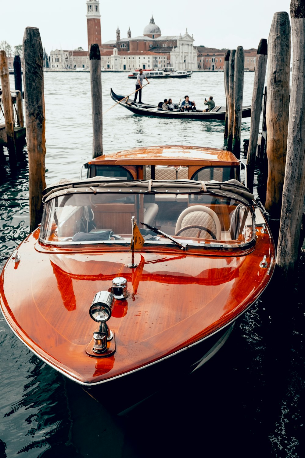 red and white boat on water during daytime