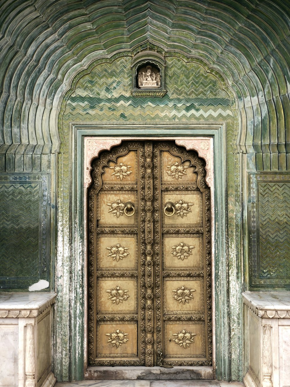 brown wooden door near white table