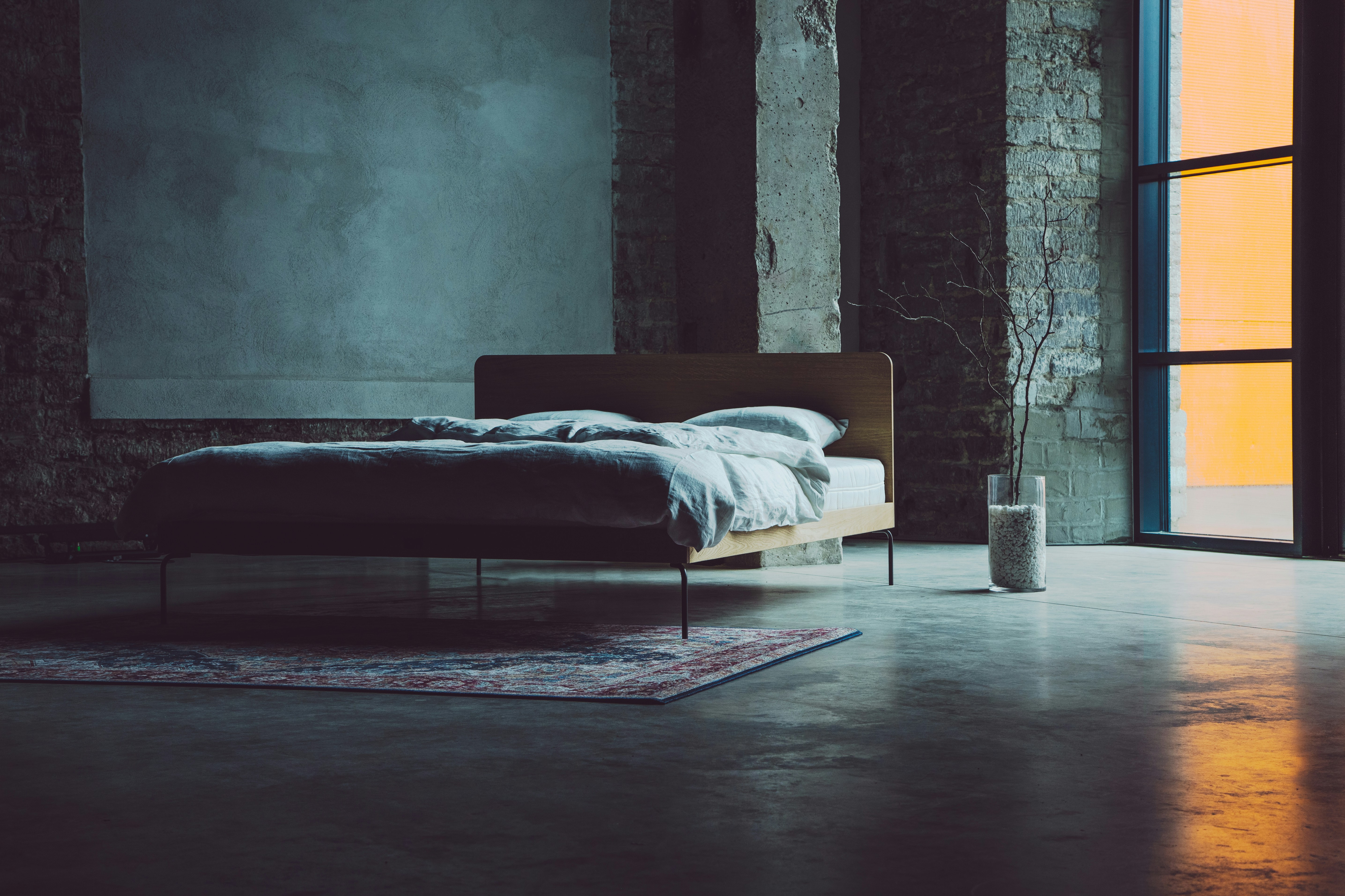 Modern solid wood (oak) bed (design by Kaissu®) industrial setting.