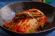 cooked kimchi on stainless steel bowl
