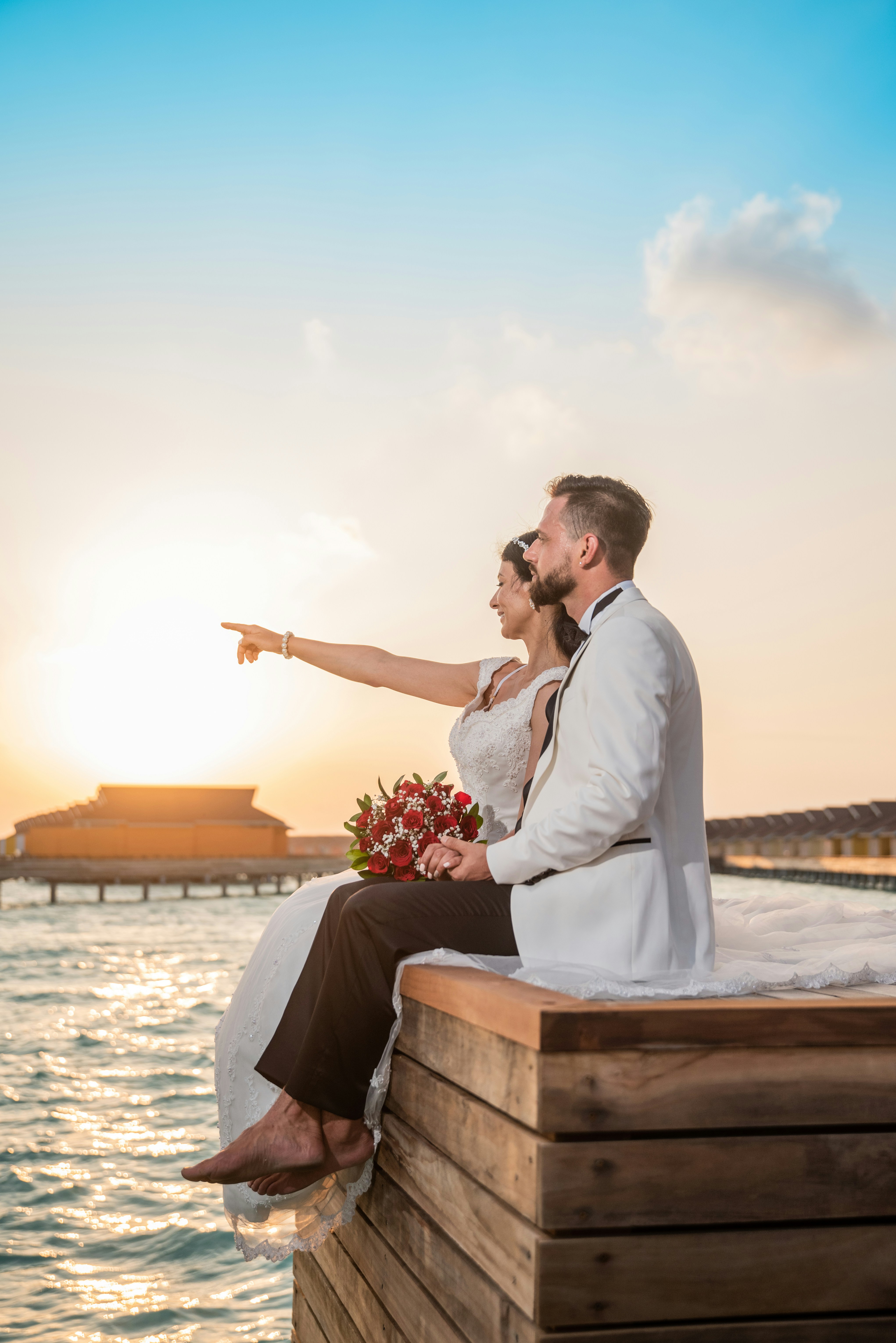 Man in white suit kissing woman in white dress during daytime photo ...
