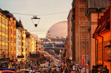 A lively street scene featuring local shops and pedestrians exploring downtown Victoria.