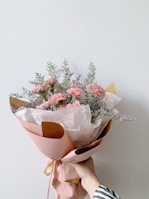 bouquet of flowers on brown wooden table