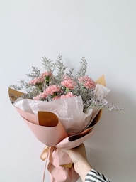 bouquet of flowers on brown wooden table