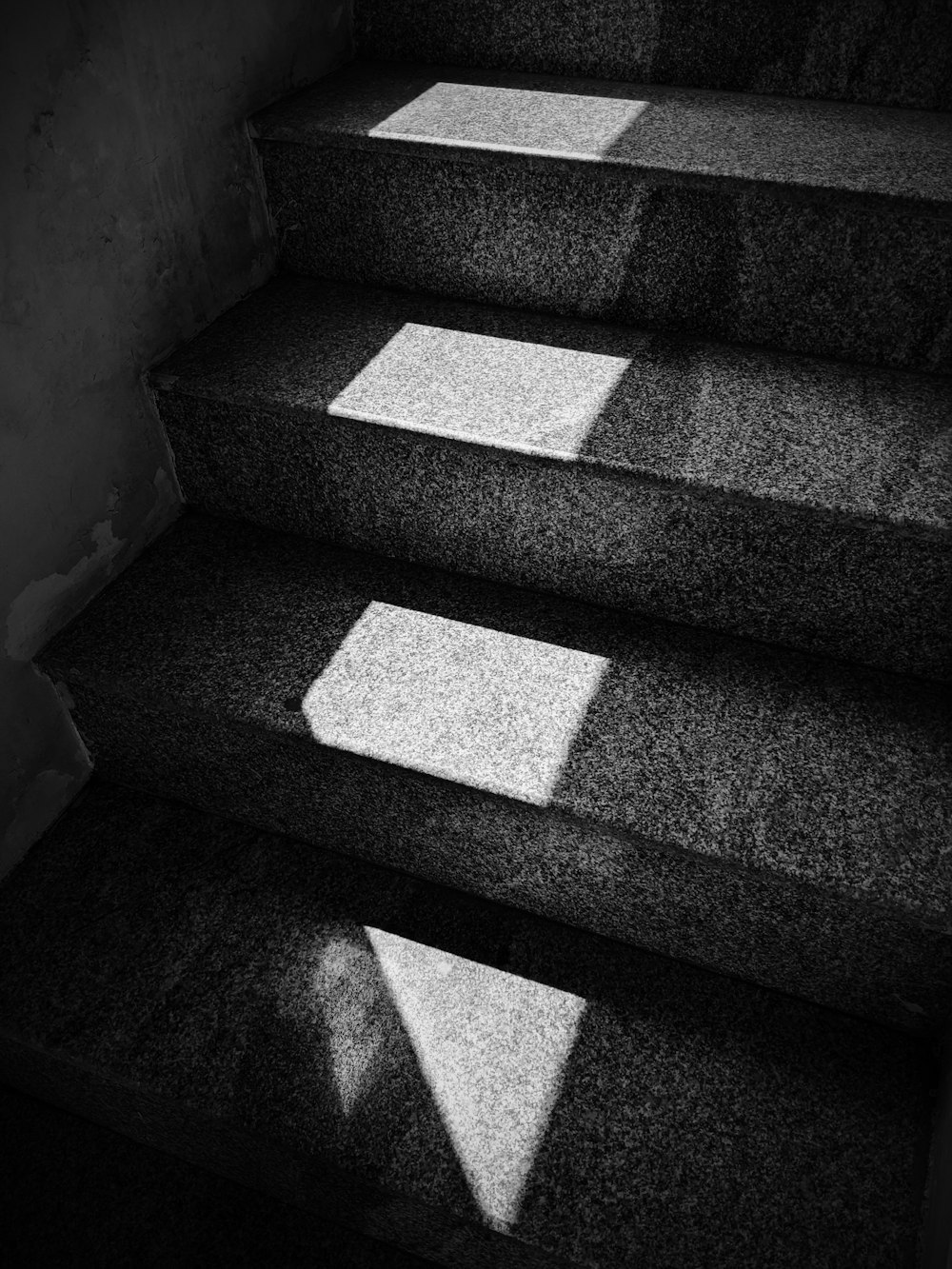 grayscale photo of concrete staircase