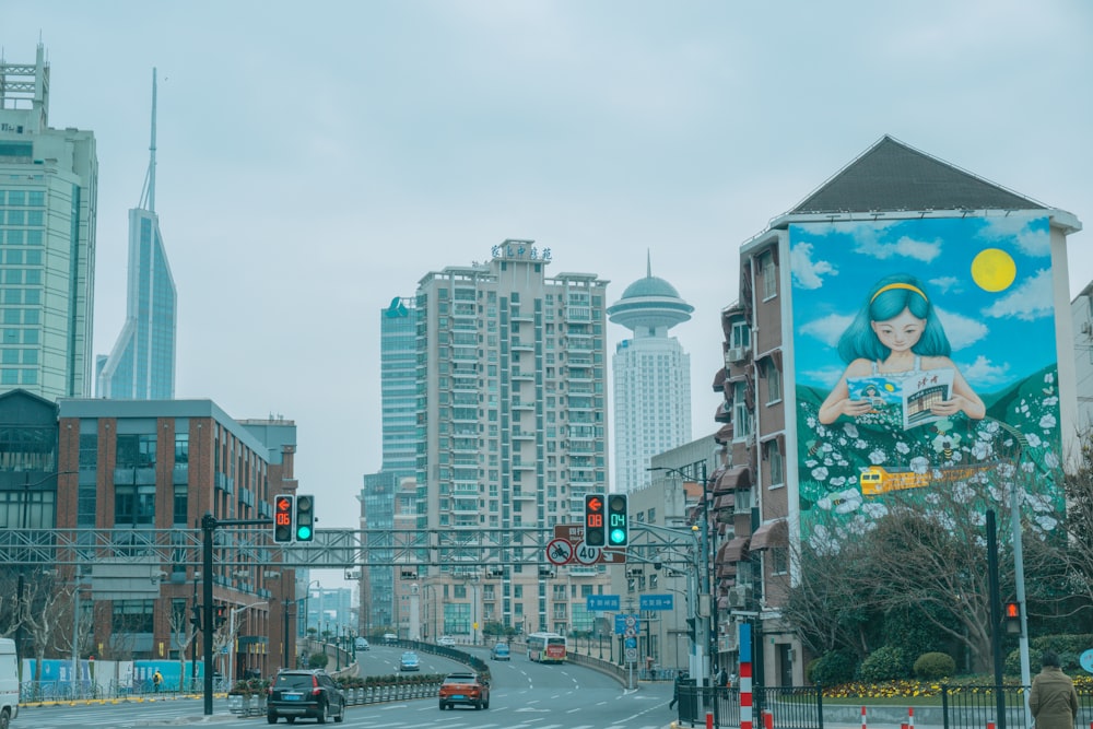 cars on road near high rise buildings during daytime