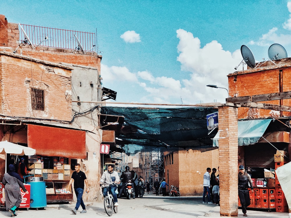 people walking on street near building during daytime