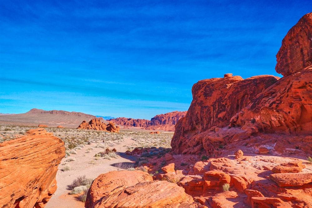 brown rocky mountain under blue sky during daytime