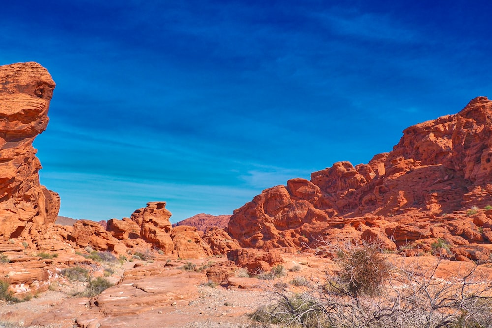 brown rock formation under blue sky during daytime