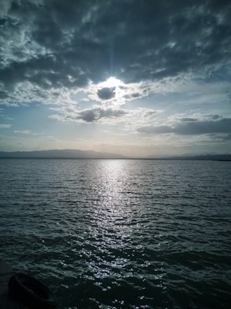 blue sea under blue sky during daytime