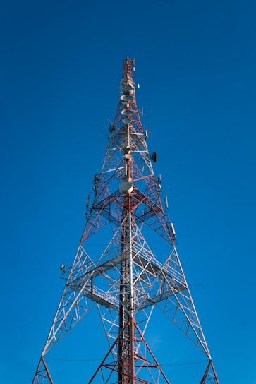 brown and red tower under blue sky