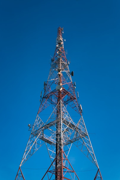brown and red tower under blue sky
