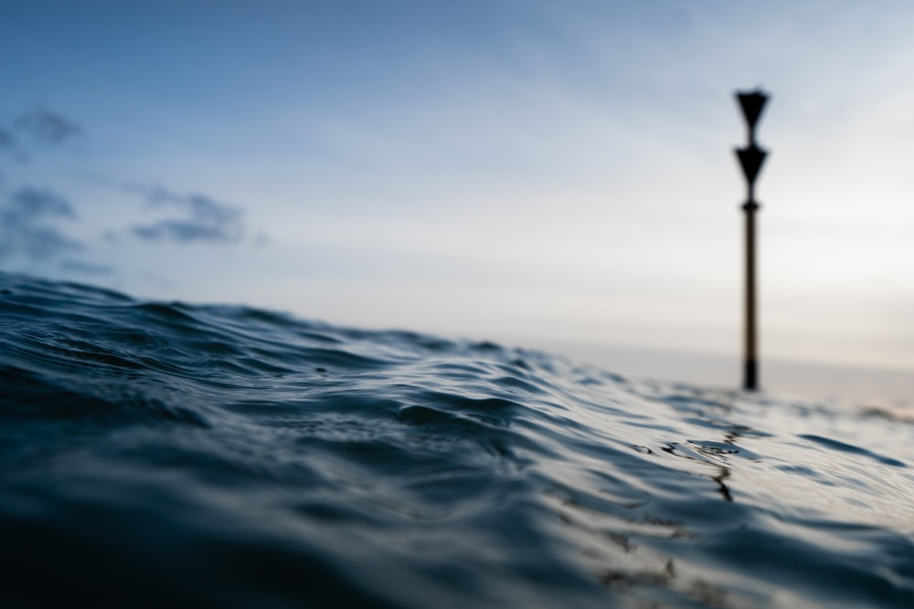 body of water under blue sky during daytime