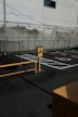 yellow and black traffic light on gray asphalt road during daytime