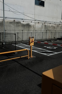 yellow and black traffic light on gray asphalt road during daytime