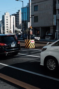 Security barriers installed at busy urban intersection controlling vehicle and pedestrian flow