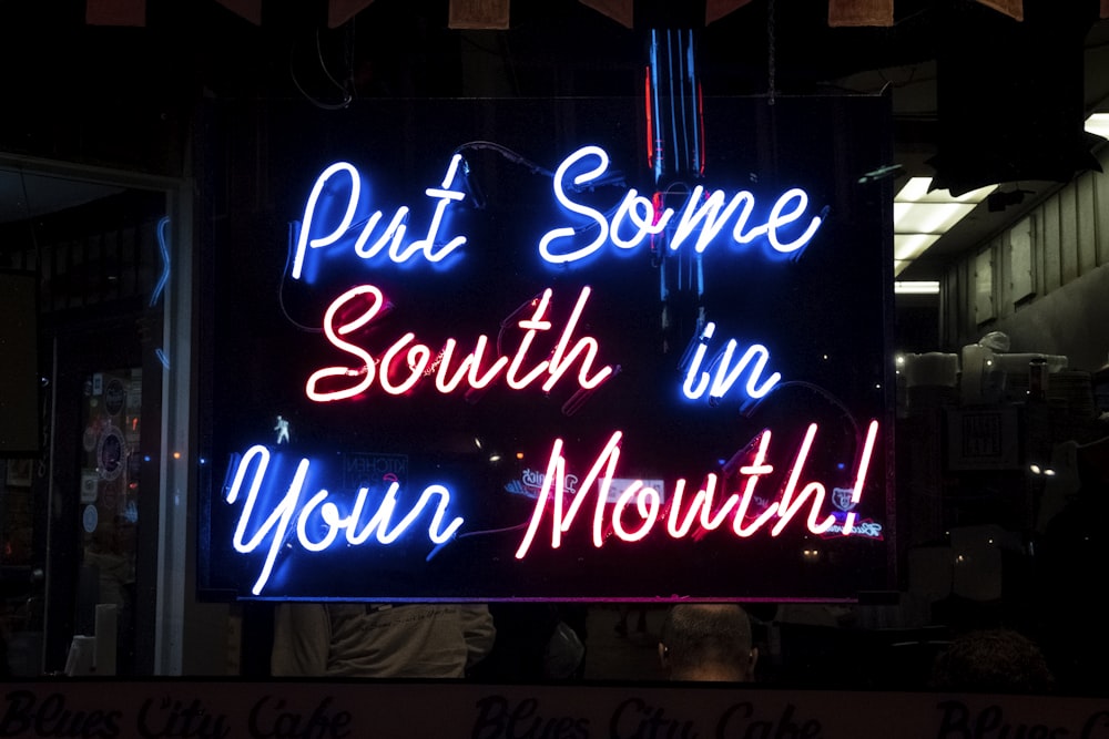 red and white UNKs coffee neon light signage