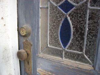 Close-up of a beautifully stained wooden door with fresh hardware.