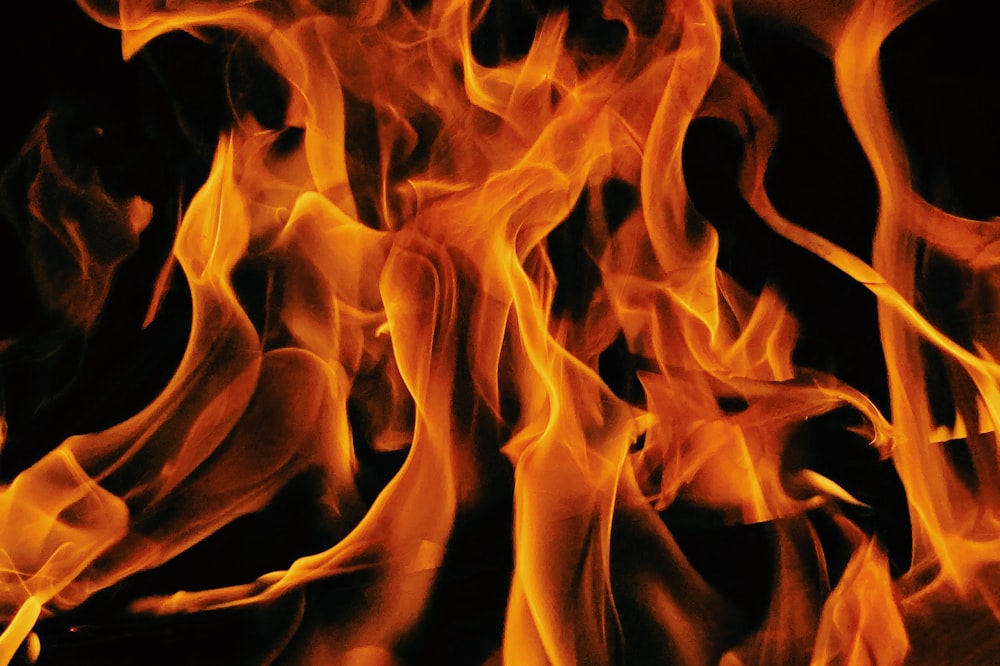 orange and yellow fire digital wallpaper