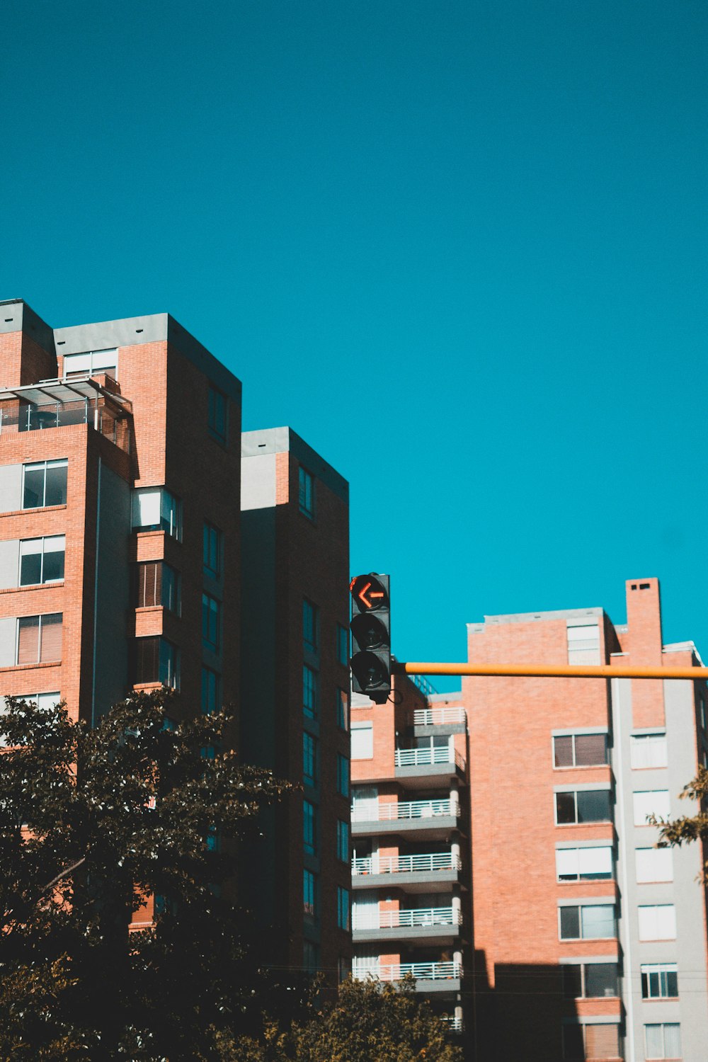 brown concrete building under blue sky during daytime