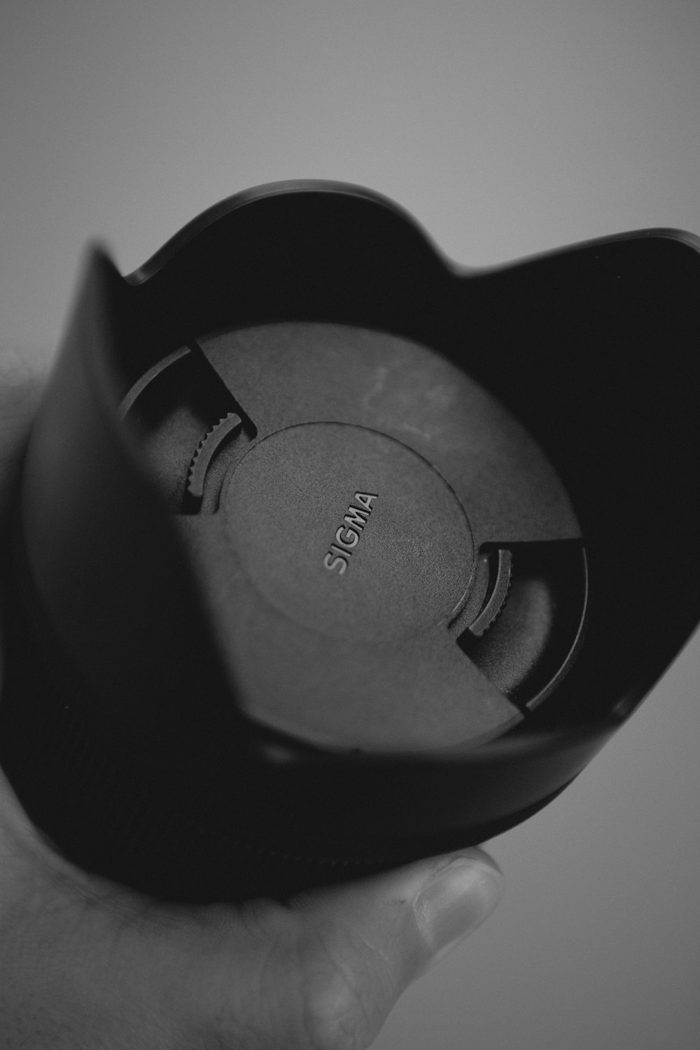 black and white canon camera lens cover