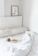 A cozy bedroom featuring a neatly made bed with a plush mattress.