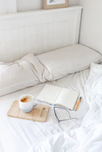 A serene morning scene with a woman enjoying chai and journaling.