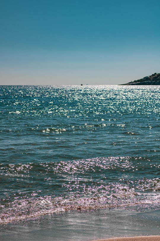 blue sea under blue sky during daytime in Varkiza Greece