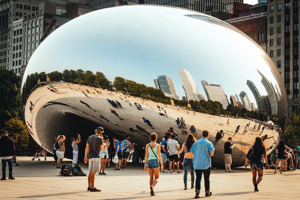 people walking on gray concrete pavement during daytime