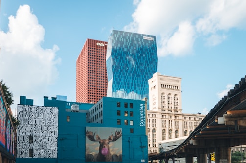 A colorful illustration of Chicago landmarks with children exploring and learning outdoors.