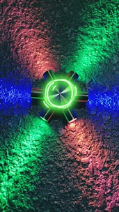 A glowing translucent green glass disc with the 'ep' monogram surrounded by orbiting arrows symbolizing intelligent data flow.