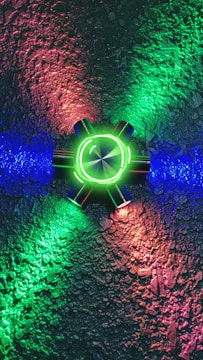 Quantum Pulse device glowing softly with blue light, resting on a reflective surface.