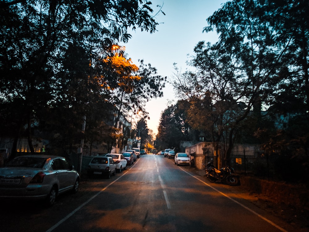 cars parked on side of the road during daytime