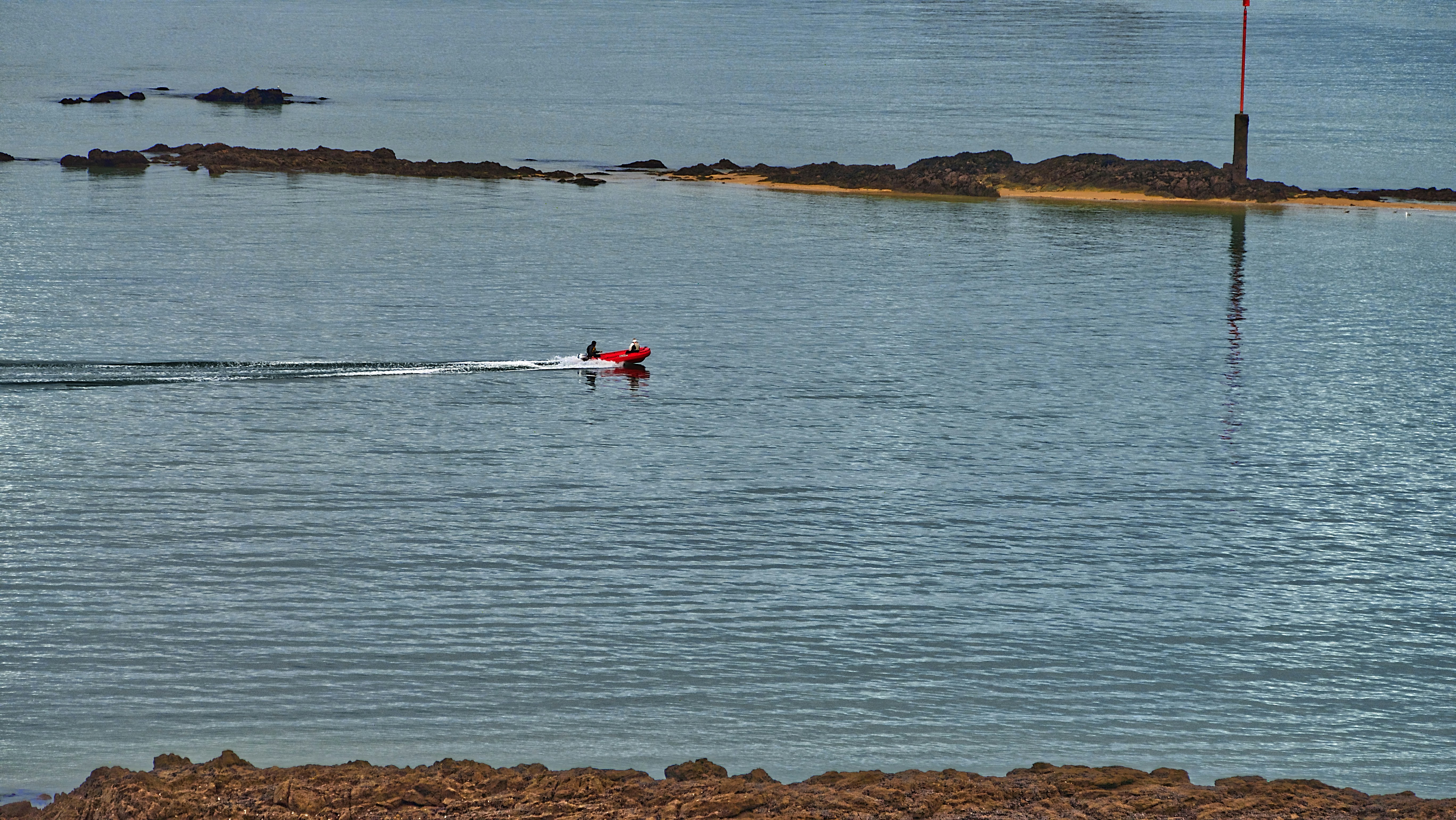 person surfing on sea during daytime